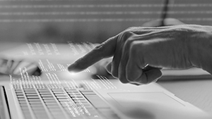 programming-background-with-person-working-with-codes-computer